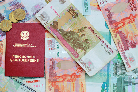 Pension certificate and Russian money close upの写真素材