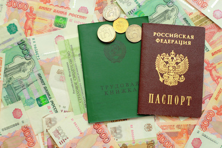 Employment records, passport and certificate of insurance on the Russian moneyの写真素材