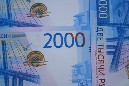 New bills 2 thousand rubles close-up. Fragment with the number 2000の写真素材