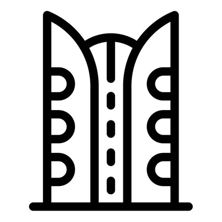 Simple black and white icon of a futuristic skyscraper with a central roadのイラスト素材