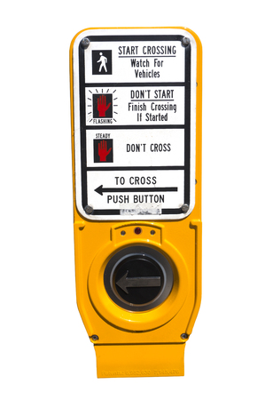 Closeup of the pedestrian crossing button or crosswalk signal button with illustrations and explanations for each symbolの写真素材