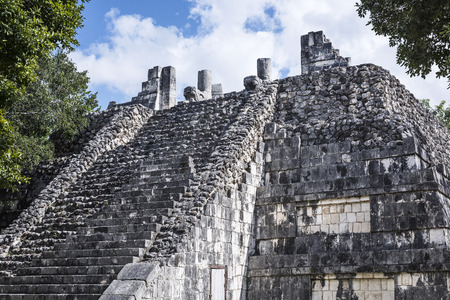 The weathered ancient Mayan building ruins of Maya Civilization in Chichen Itza, Mexicoの写真素材