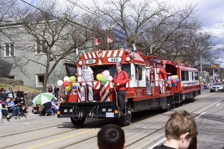 members of Rameses Shriners on float at the Beaches Easter Parade 2017 on Queen Street East Toronto.のeditorial素材