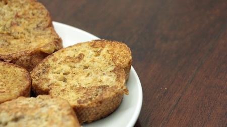 Homemade French Toast with Honey on White Plate
