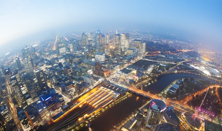 View of Melbourne CBD at twilight with major landmarks in the city including the Flinders Street railway station Melbourne Cricket Ground MCG and Federation Squareの写真素材