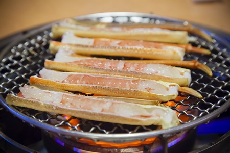 Barbeque crab legs in a Japanese restaurantの写真素材