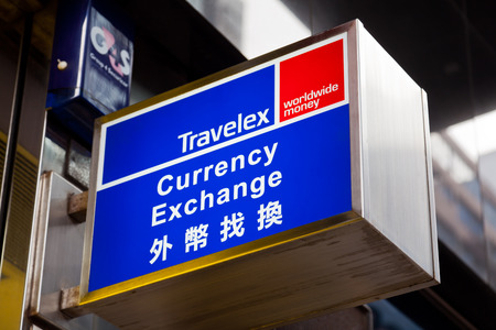 Hong Kong, China - August 21, 2011: Sign of Travelex currency exchange at its branch at Central, Hong Kong. Travelex is the world's largest foreign exchange company. It has over 950 retail branches across 24 countries.のeditorial素材