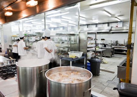 Shaoguan, China - September 24, 2011: Open chinese commercial kitchen in a restaurant in Shaoguan, Chinaのeditorial素材