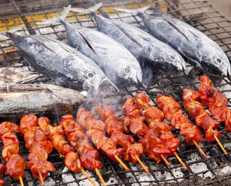 Barbecue fish and meat at a street food stall