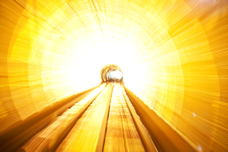 Abstract motion blurred image of travelling through a tunnelの写真素材