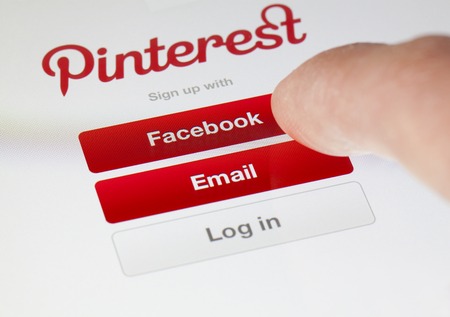 Adelaide, Australia - Aug 18, 2013: A user logging in the Pinterest app on an iPad