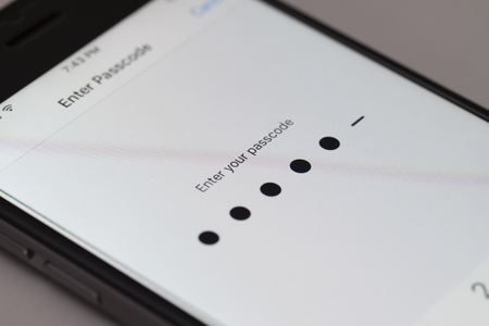 Melbourne, Australia - Sep 24, 2015: Enter passcode screen on an iPhone running iOS 9.  This new iOS...