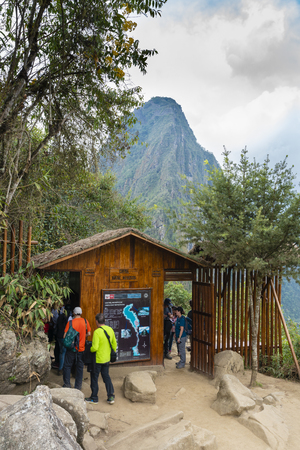 Tourist hiking up Huayna Picchu at Machu Picchuのeditorial素材