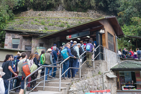 Tourist lining up at the entrance of Machu Picchu in Peruのeditorial素材