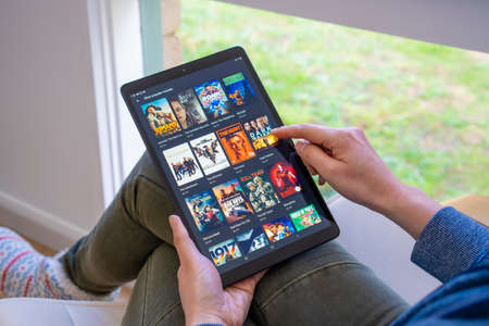 Melbourne, Australia - Jul 20, 2020: Browsing movies in Google Play Store