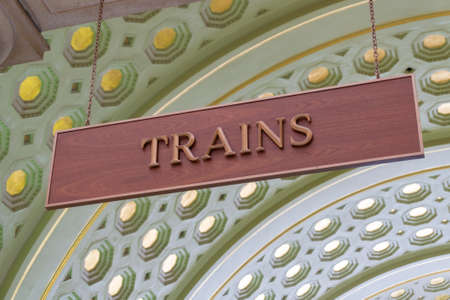 Close-up view of train sign in a railway stationの写真素材