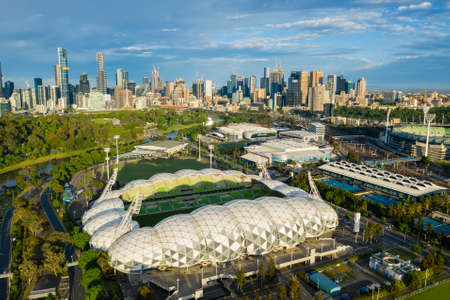 Aerial photo of Melbourne sporting venues and CBD at sunriseのeditorial素材