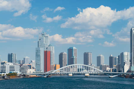 Tsukiji Ohashi Bridge over the Sumida River and buildingsの写真素材