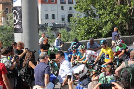 GRENOBLE, FRANCE - JUNE 13 Chris Froome and Alberto Contador starting stage 6 of Le Criterium du Dauphine UCI World Tour on June 13, 2014 in Grenoble, Isere, France Jan Bakelants won the race GRENOBLE, FRANCE - JUNE 13 Chris Froome and Alberto Contador starting stage 6 of Le Criterium du Dauphine UCI World Tour on June 13, 2014 in Grenoble, Isere, France Jan Bakelants won the race