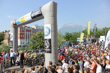 GRENOBLE, FRANCE - JUNE 13 Start of Stage 6 of Le Criterium du Dauphine UCI World Tour on June 13, 2014 in Grenoble, Isere, France with Chris Froome and Alberto Contador Jan Bakelants won the race GRENOBLE, FRANCE - JUNE 13 Start of Stage 6 of Le Criterium du Dauphine UCI World Tour on June 13, 2014 in Grenoble, Isere, France with Chris Froome and Alberto Contador Jan Bakelants won the race