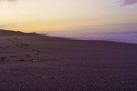 Sunset on the beach of Punta Arenas, Chile.の写真素材