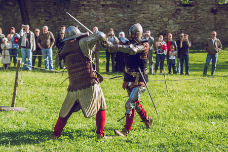 Cesis, Latvia, Medival festival in Livonian Castle, Street view, medival fight, 2015 year. It's a travel photo, when I walk around city.のeditorial素材