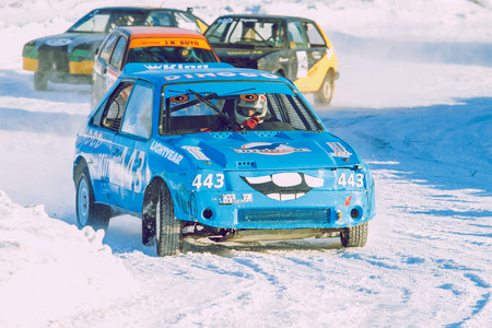 Folkrace rally, cars, city Cesis, winter 2011. This is folkrace in Latvia. Meany peoples come to this race and fight whith cars. It's popular and interesting sport.のeditorial素材
