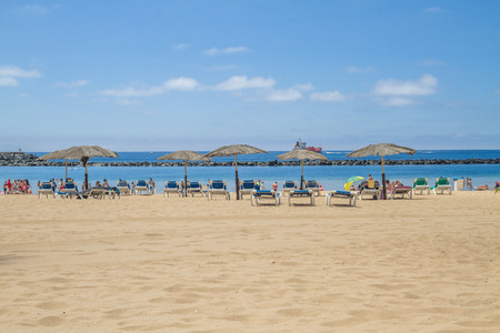 Tenerife, Spain, beach, palms and peoples. White beach. 2015のeditorial素材