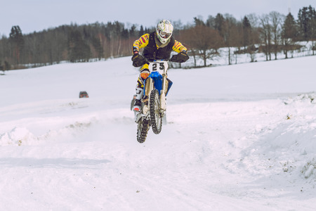 Latvia, Raiskums, Winter motocross, Driver with motorcycle, race. 2013