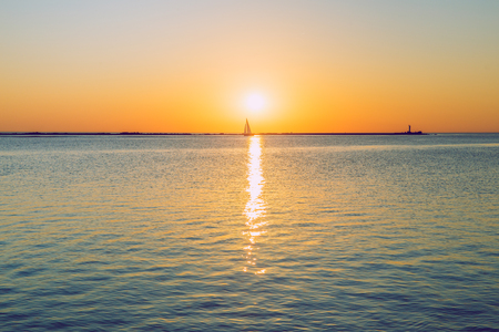 Latvia, Riga, Baltic sea, sunset, mole and wave, yacht. 2017のeditorial素材