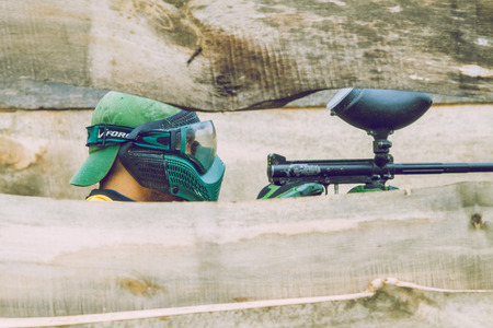 Paintball game battle, players and guns. Latvia, Cesis. 2012のeditorial素材