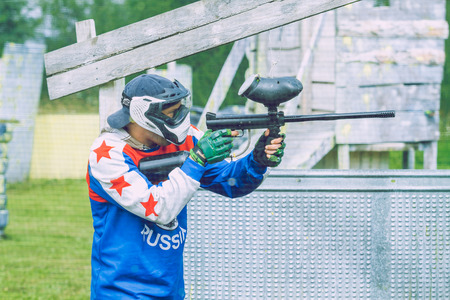 Paintball game battle, players and guns. Latvia, Cesis. 2012のeditorial素材