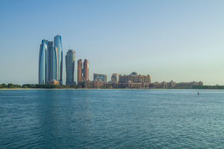 Abu dabi, United Arab Emirates, 15.11.2015 Skylines and city. Sunny day in Urban city, water and buildings. It's a travel photo.のeditorial素材