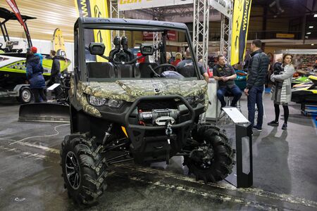 City Riga, Latvia. Technical exhibition. BRP motorcycles, boats, water cube, peoples and...