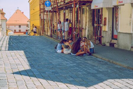 Pula, Crotia, 2016, Street view, peoples sit at street way. Old city and street. It's a travel photo, when I walk around city.のeditorial素材