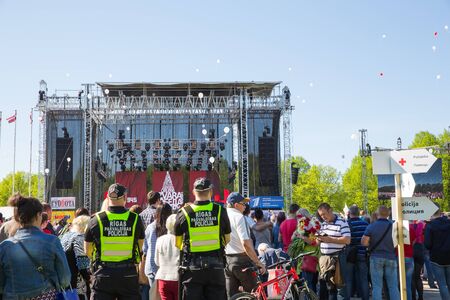 Latvia, city Riga, Victory park, May 9, celebration 73 year after world war 2, peoples, flowers and sun. Travel photo 2018のeditorial素材