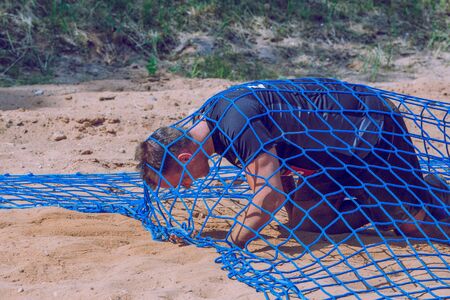 City Ikskile, Latvia. Daring race, sport event. Outdoor training, people are running. Sunny day. 2018 Travel photo.のeditorial素材
