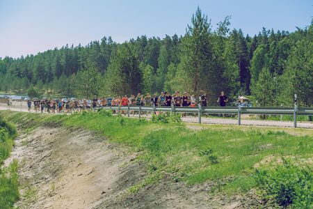 City Ikskile, Latvia. Daring race, sport event. Outdoor training, people are running. Sunny day. 2017 Travel photo.のeditorial素材