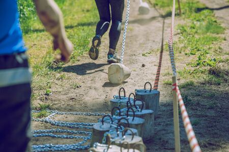 City Ikskile, Latvia. Daring race, sport event. Outdoor training, people are running. Sunny day. 2017 Travel photo.のeditorial素材