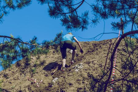City Ikskile, Latvia. Daring race, sport event. Outdoor training, people are running. Sunny day. 2017 Travel photo.のeditorial素材