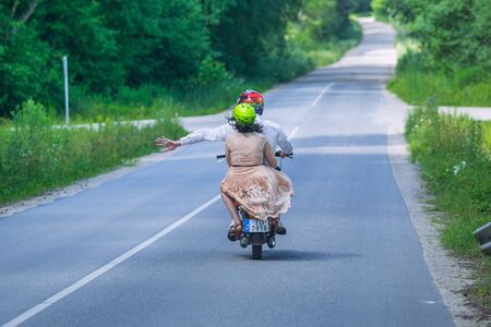 City Cesis, Latvia. People drive with motorcycle at street. Urban city view. Travel photo 2017.のeditorial素材