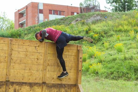 City Cesis Latvia. Daring race, sport event. Outdoor training, people are running. Sunny day. 2018 Travel photo.のeditorial素材