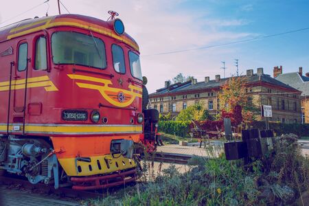 City Riga, Latvia. Old train at Latvian Railway museum. Buildings and street view. Travel photo...