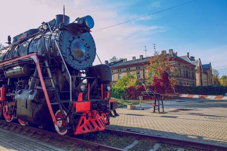 City Riga, Latvia. Old train at Latvian Railway museum. Buildings and street view. Travel photo 2018.のeditorial素材
