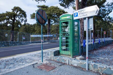 City Paphos, Cyprus. Old telephone hut at street. Urban view. Travel photo 2018, december.のeditorial素材