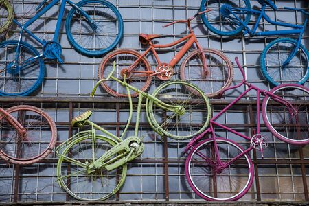 City Valmiera, Latvia. Urban street wall with bicycle. Travel photo 2018. december.のeditorial素材