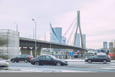 City Riga, Latvia. Old city streets, tourists and architecture. Old bridge, streets and urban view....