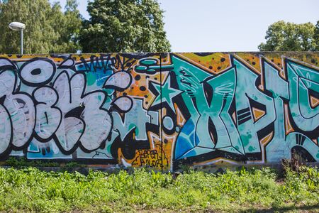 City Riga, Latvian Republic. Colored wall, street graffiti. 2019. 24. July. Travel photo.のeditorial素材