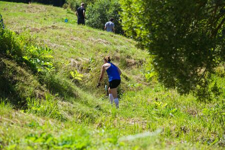 City Cesis, Latvian Republic. Run race, people were engaged in sports activities. Overcoming various obstacles and running.  July 21. 2019.のeditorial素材