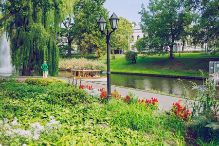 City Riga, Latvia republic. Riga Central Park with tourists and flowers, resting place.18 Aug. 2019